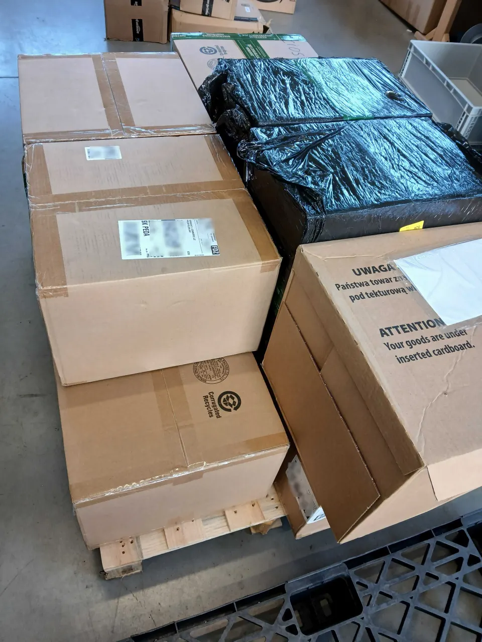 Cartons with fragile-goods labels ready for shipping from a KRINOVA warehouse